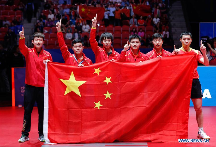 Equipa masculina chinesa arrecada 9o título consecutivo nos mundiais de ténis de mesa
