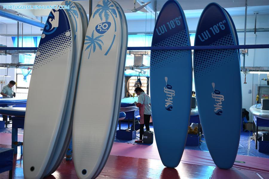 Parque industrial de redu??o da pobreza beneficia moradores em vila de Jiangsu