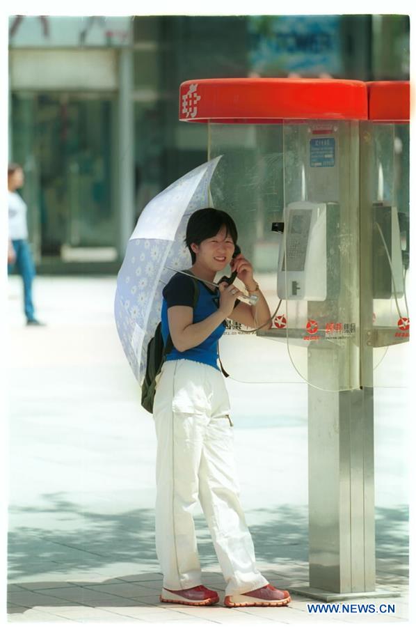 História em fotos: Desenvolvimento da indústria de telecomunica??es da China em 4 décadas