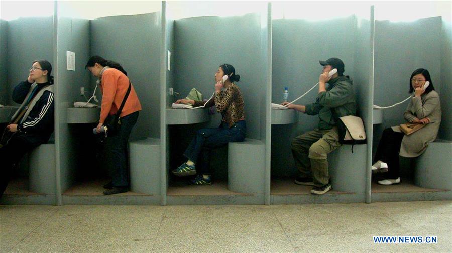 História em fotos: Desenvolvimento da indústria de telecomunica??es da China em 4 décadas