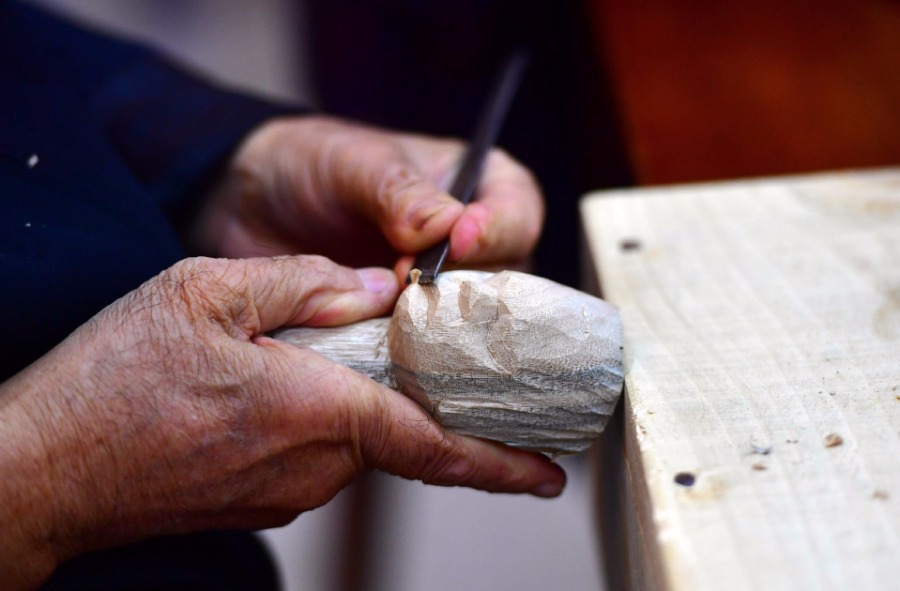 Galeria: Artes?os chineses de Zhangzhou protegem forma de arte local