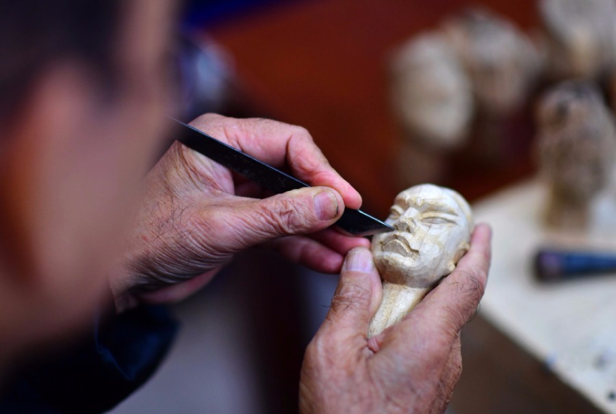 Galeria: Artes?os chineses de Zhangzhou protegem forma de arte local