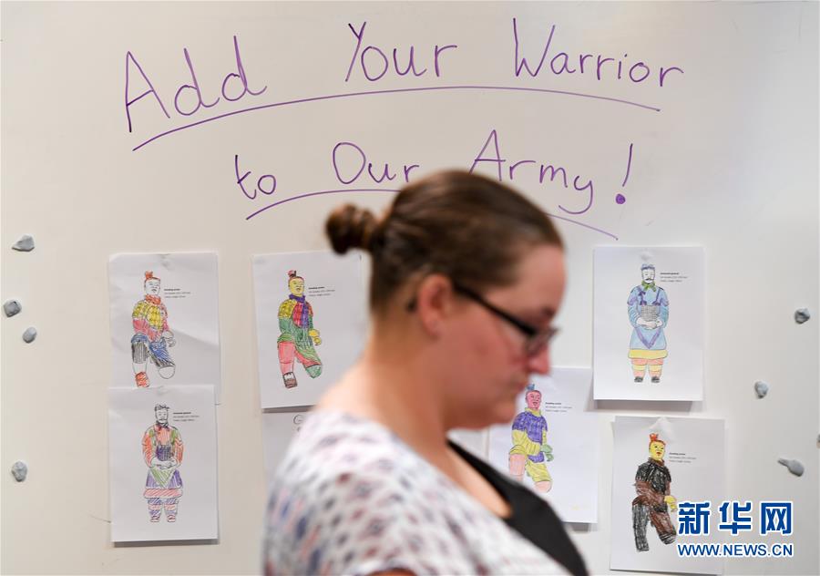 Nova Zelandia: crian?as locais establecem contacto com elementos de cultura tradicional chinesa 