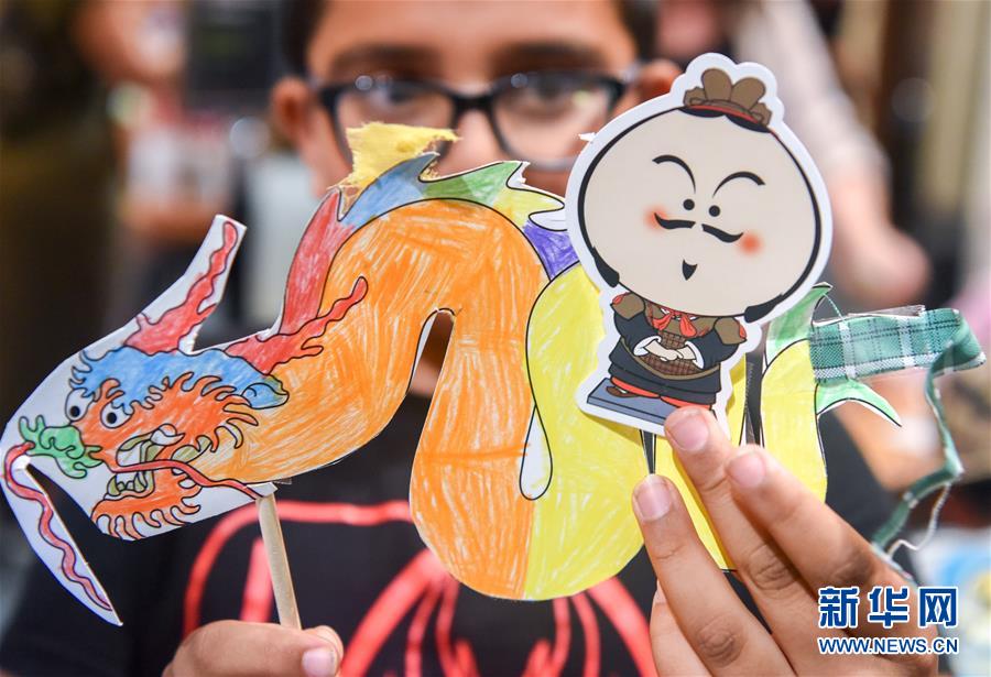 Nova Zelandia: crian?as locais establecem contacto com elementos de cultura tradicional chinesa 