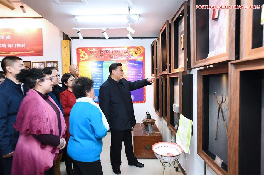Xi visita quadros e residentes em Beijing antes da Festa da Primavera