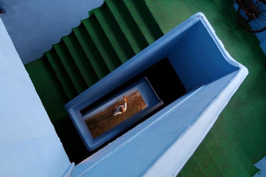 Decorador de interiores chinês captura fotos da beleza de escadas em espiral