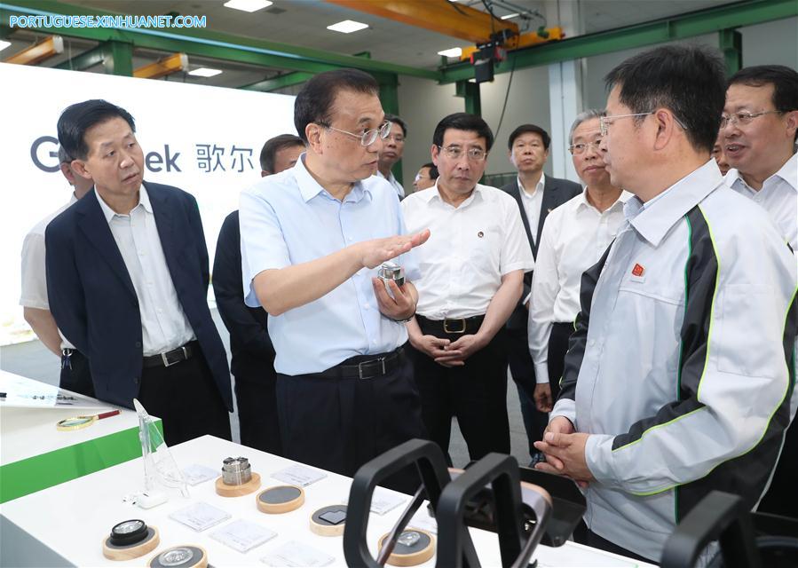 Premiê chinês destaca redu??o de impostos e tarifas e melhora de servi?os financeiros