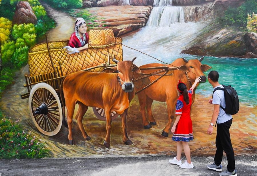 Pinturas murais fazem da aldeia um resort turístico em Jiangxi, leste da China