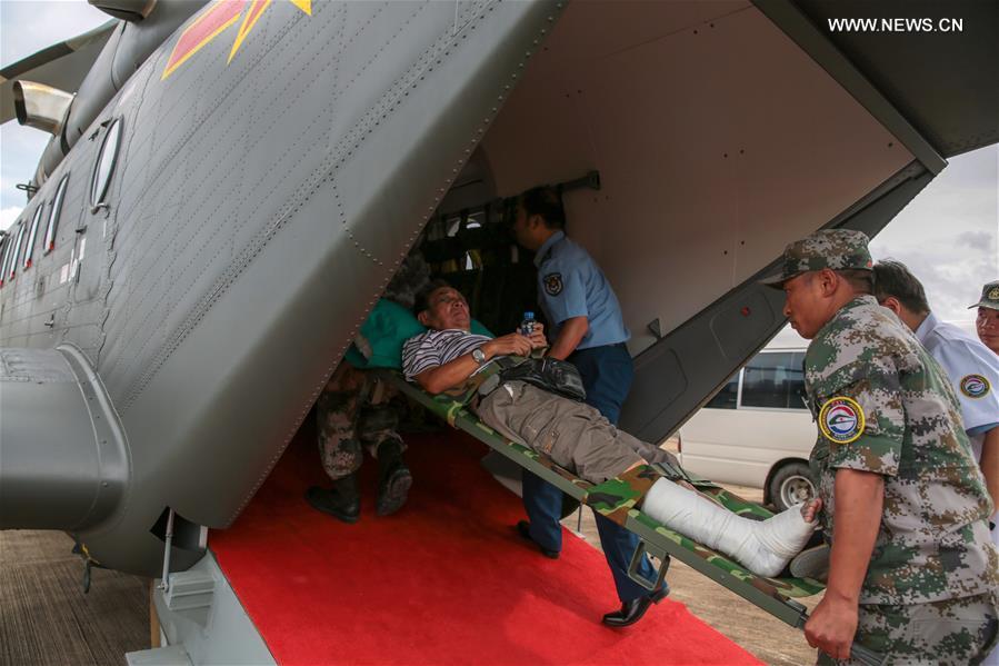 4 turistas chineses gravemente feridos em acidente de ?nibus no Laos voam de volta à China