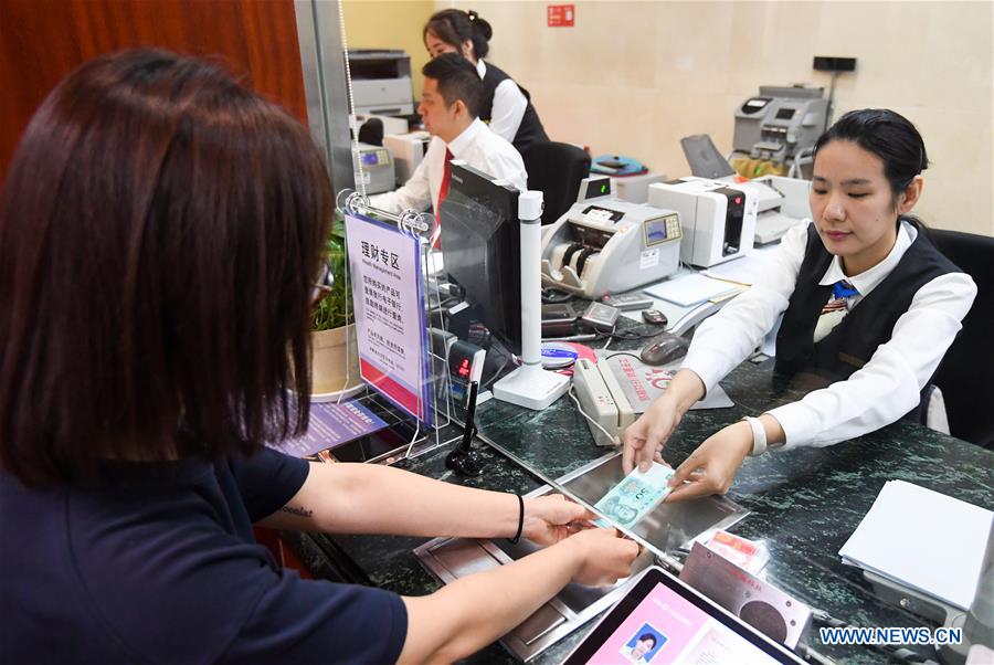 China emite nova edi??o de notas e moedas do RMB