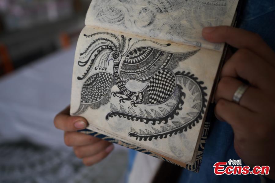 Guizhou: Artesanato tradicional ajuda popula??o a sair da pobreza