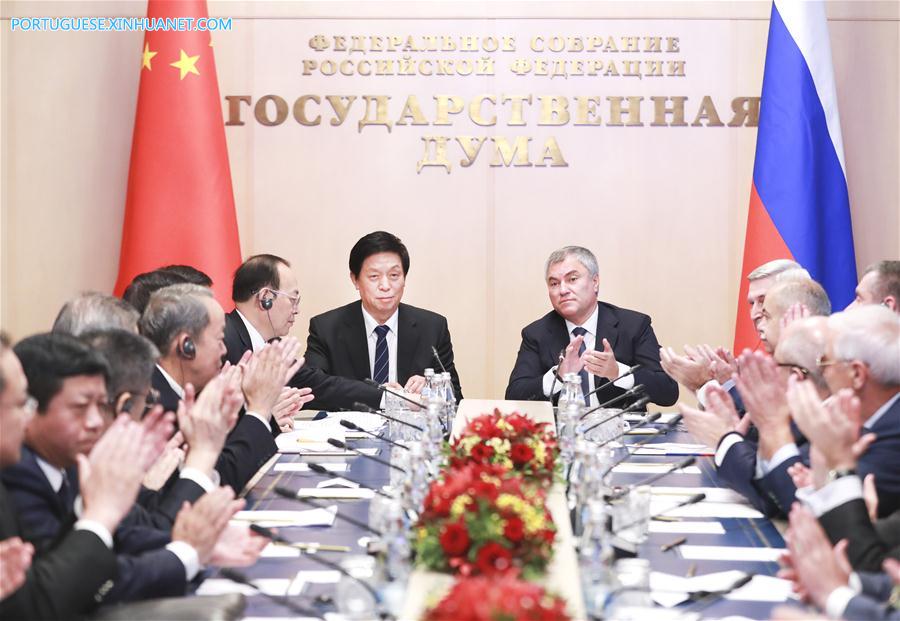 China e Rússia prometem promover coopera??o extensa e coordena??o legislativa