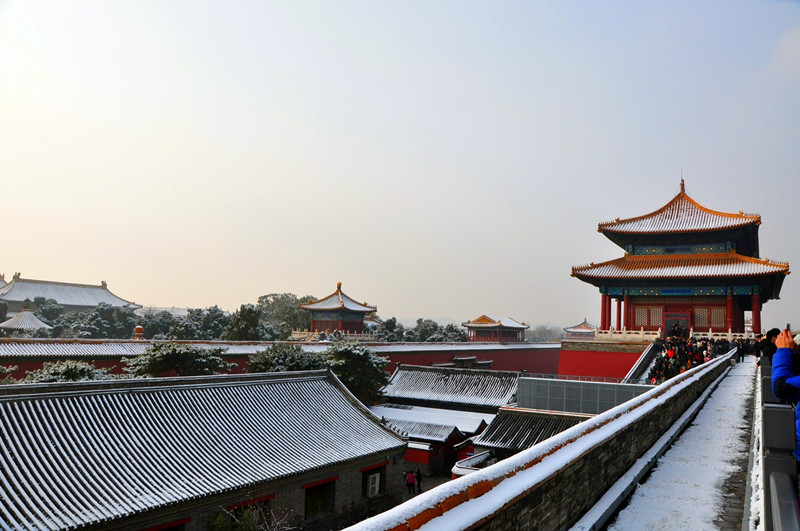 Galeria: Cidade proibida coberta de neve atrai visitantes