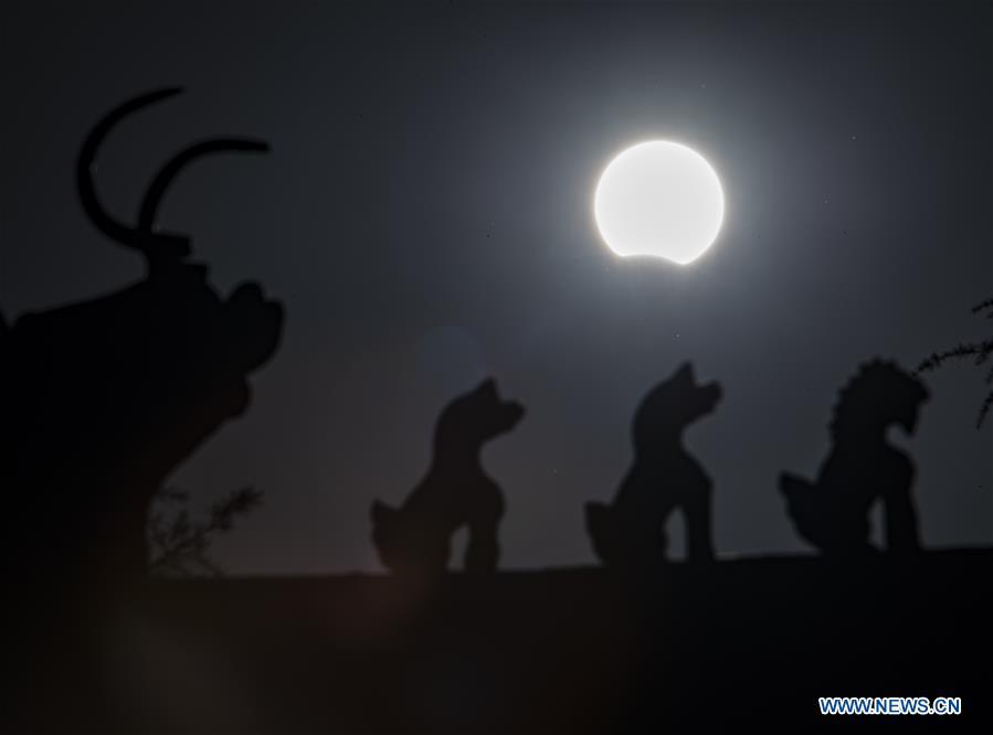 Galeria: eclipse solar parcial em Haikou