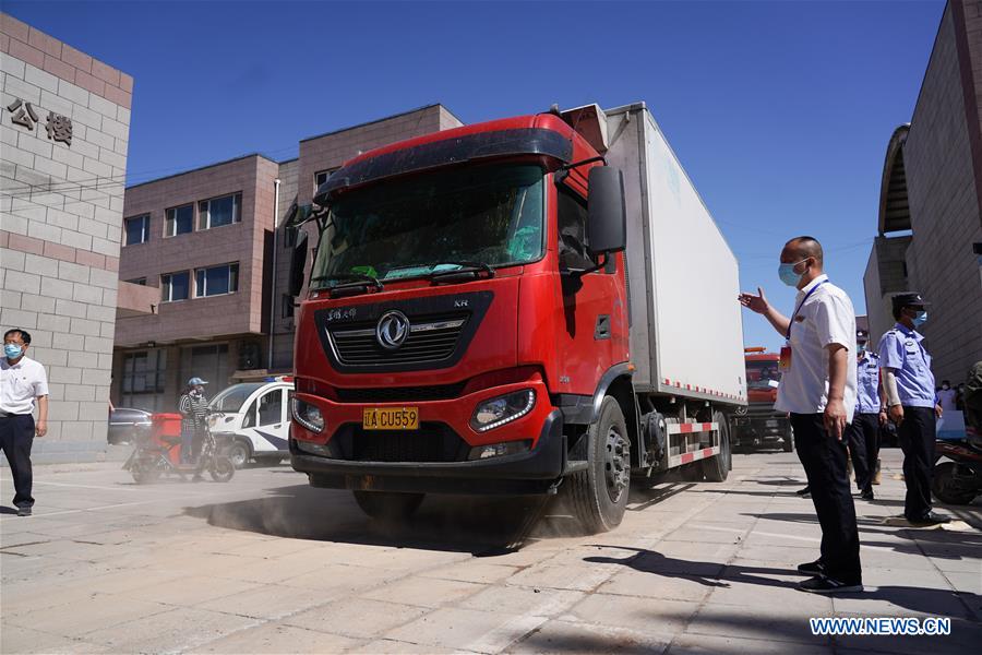 Beijing designa locais provisórios para venda de legumes após suspens?o do mercado atacadista de Xinfadi