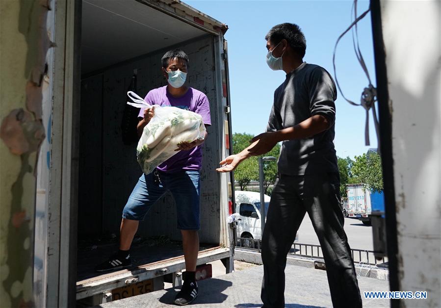 Beijing designa locais provisórios para venda de legumes após suspens?o do mercado atacadista de Xinfadi