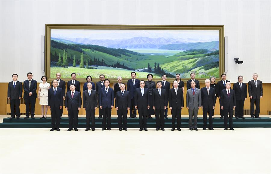 Premiê chinês pede maior contribui??o de conselheiros e pesquisadores