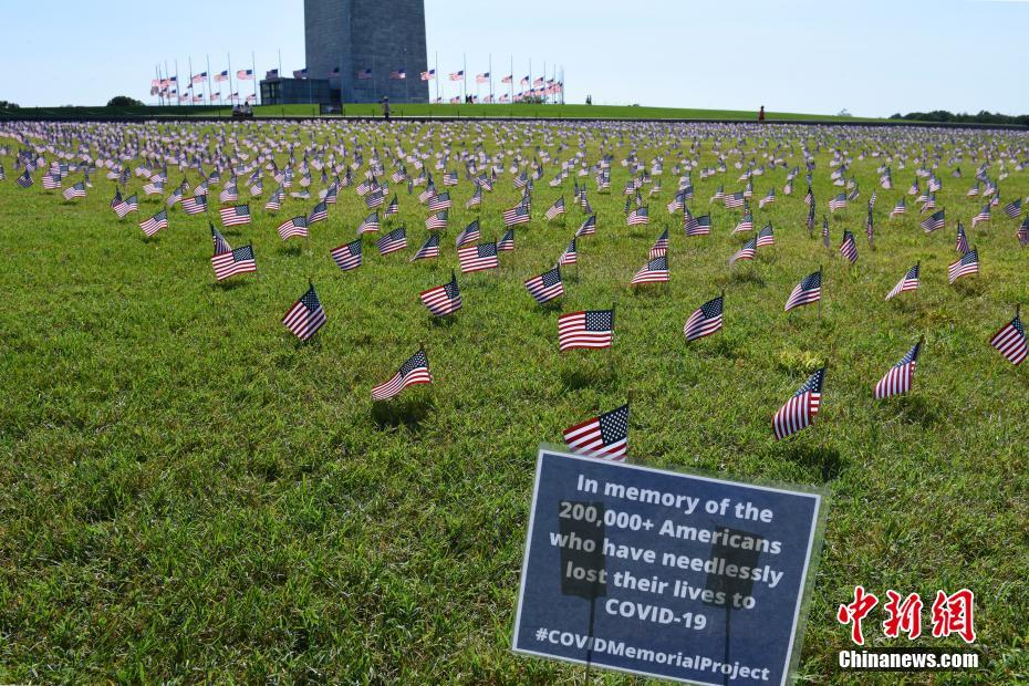 Washington lamenta vítimas de Covid-19 com 200.000 bandeiras na Pra?a Nacional