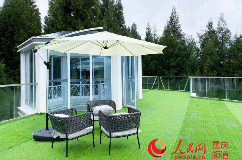 Chongqing: biblioteca instalada em área de servi?o em regi?o florestal