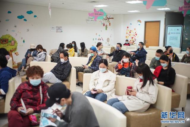 Beijing realiza campanha de vacina??o da Covid-19 para estrangeiros