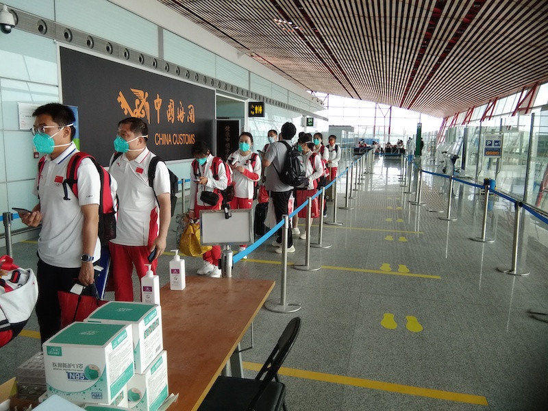 Todos os atletas chineses que participaram das Olimpíadas de Tóquio regressaram a Beijing