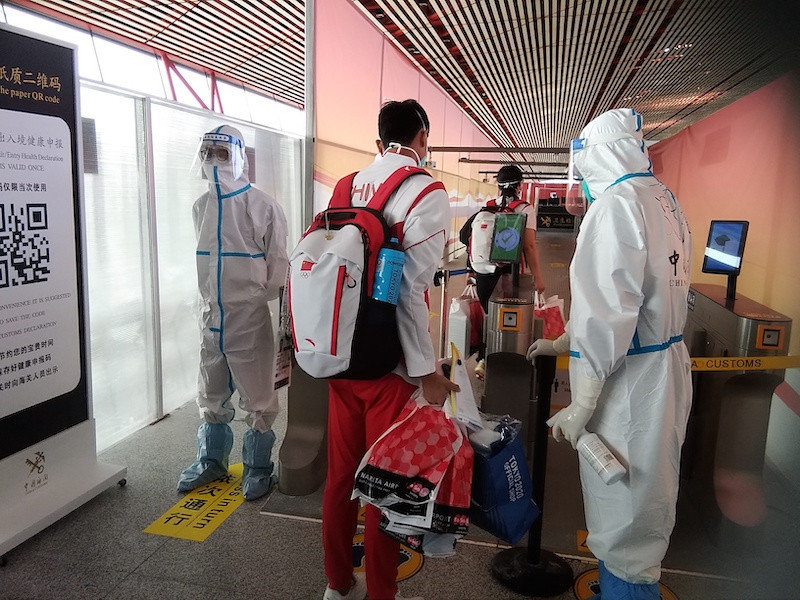 Todos os atletas chineses que participaram das Olimpíadas de Tóquio regressaram a Beijing