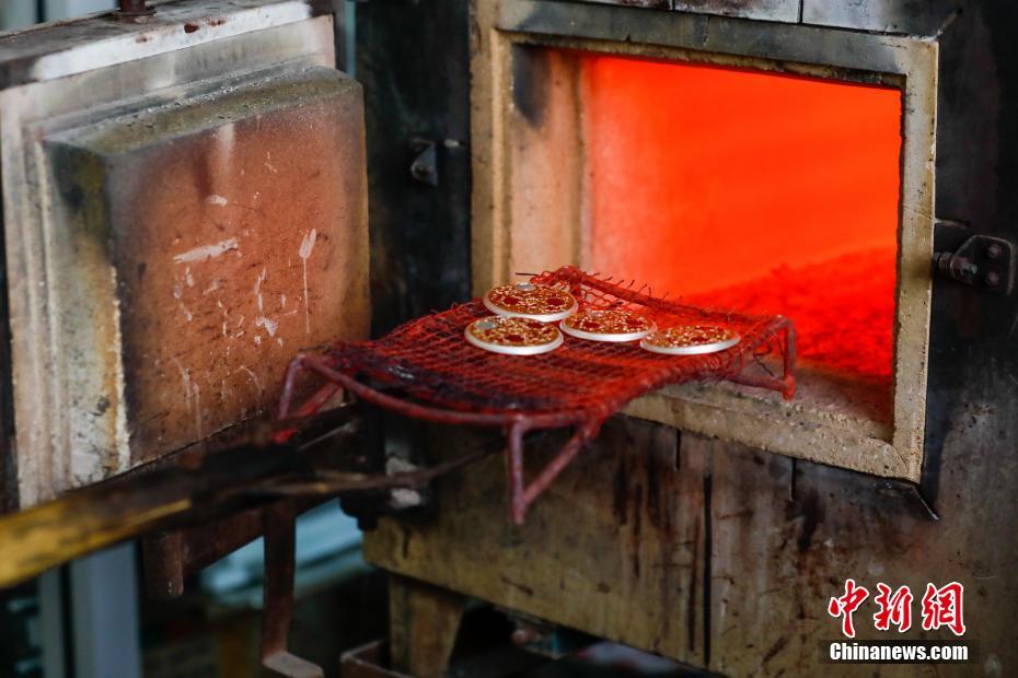 Beijing 2022: produto cultural e criativo de “pedra de curling” usa técnicas de patrim?nio cultural imaterial 