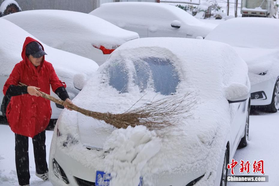 China: onda de frio atinge muitas partes de país com queda de neve e de temperatura
