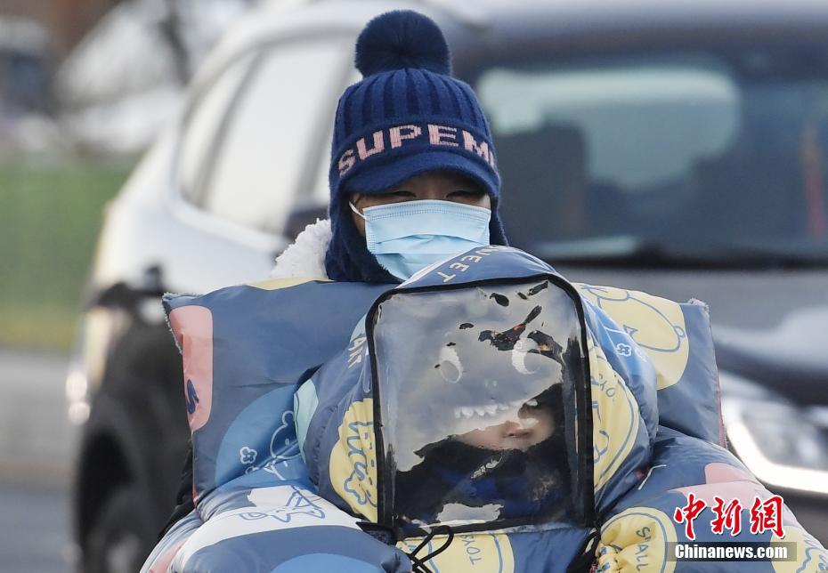 China: onda de frio atinge muitas partes de país com queda de neve e de temperatura