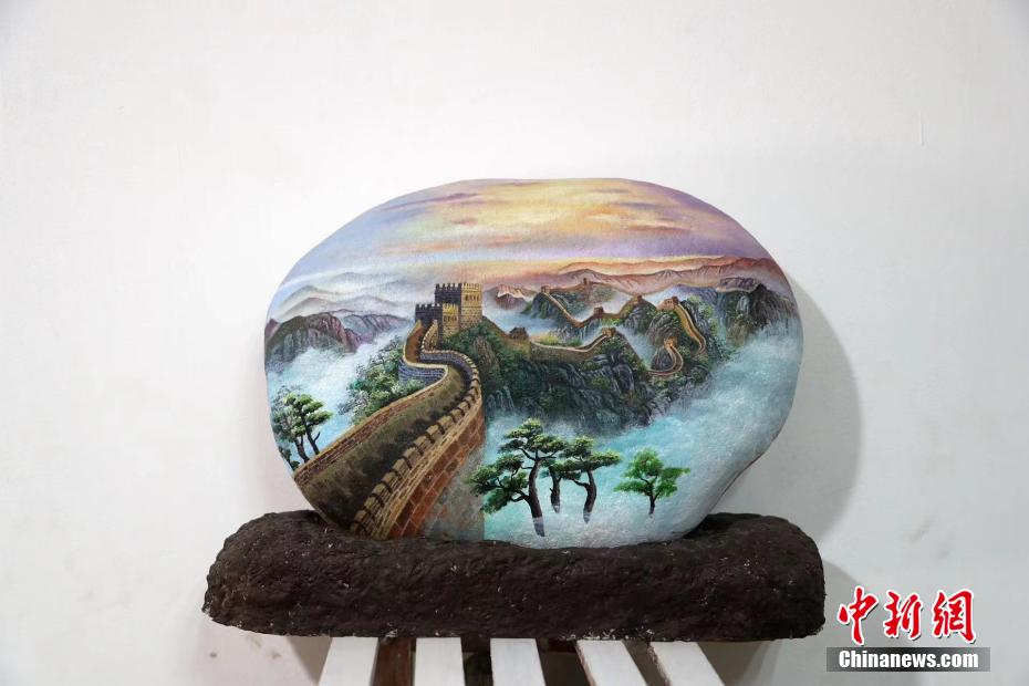 Hebei: artista folclórica faz pinturas em rochas