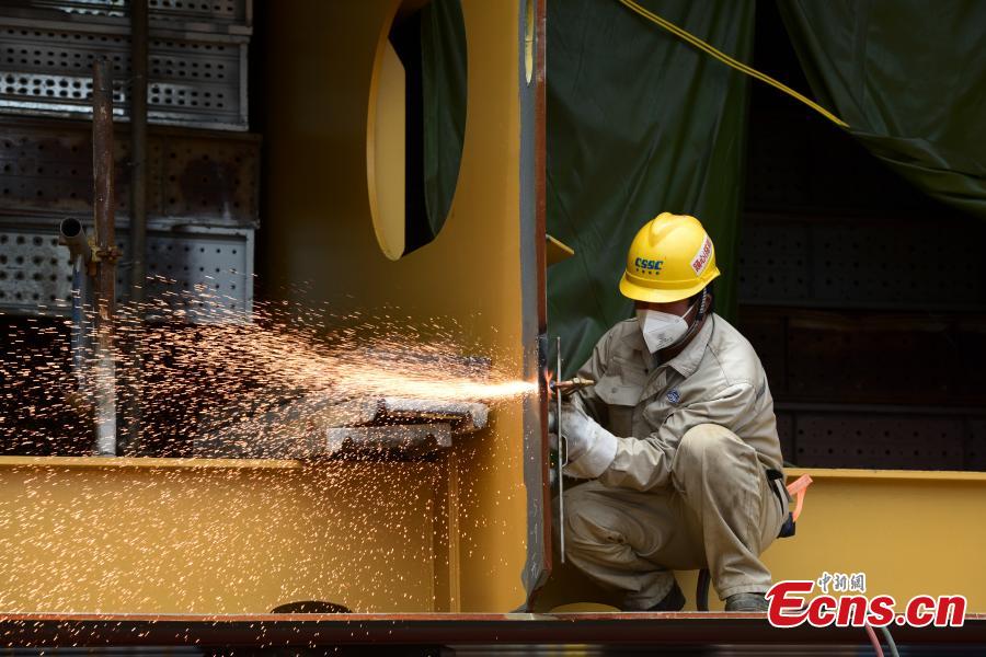 Empresa da constru??o naval em Shanghai tenta recuperar produ??o