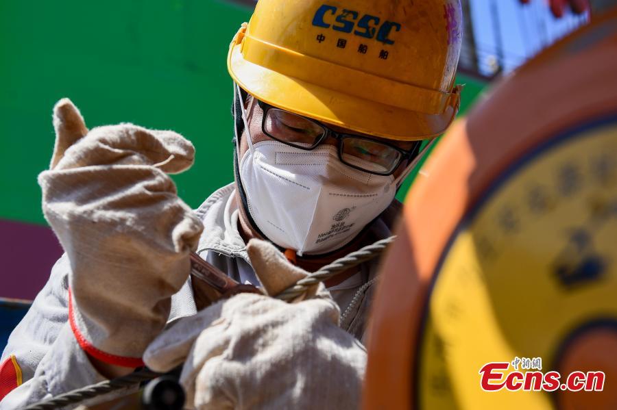 Empresa da constru??o naval em Shanghai tenta recuperar produ??o