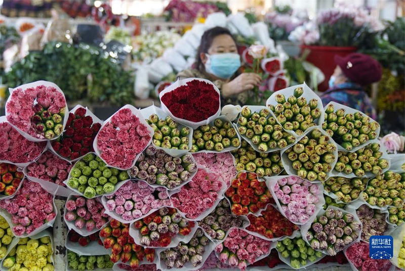 Mercados de flores est?o animados com aproxima??o do Ano Novo