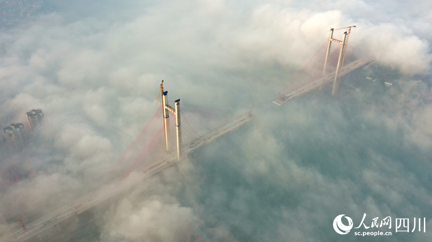 Constru??o da ponte Naxi segue em andamente em Sichuan