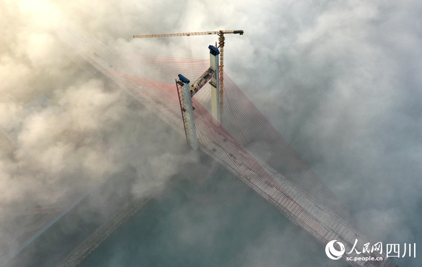 Constru??o da ponte Naxi segue em andamente em Sichuan