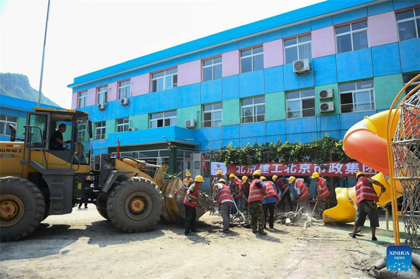 Beijing: escolas iniciam processo de reconstru??o após cheias