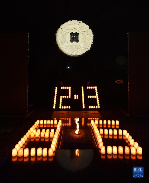 Nanjing realiza cerim?nia à luz de velas em homenagem às vítimas do massacre