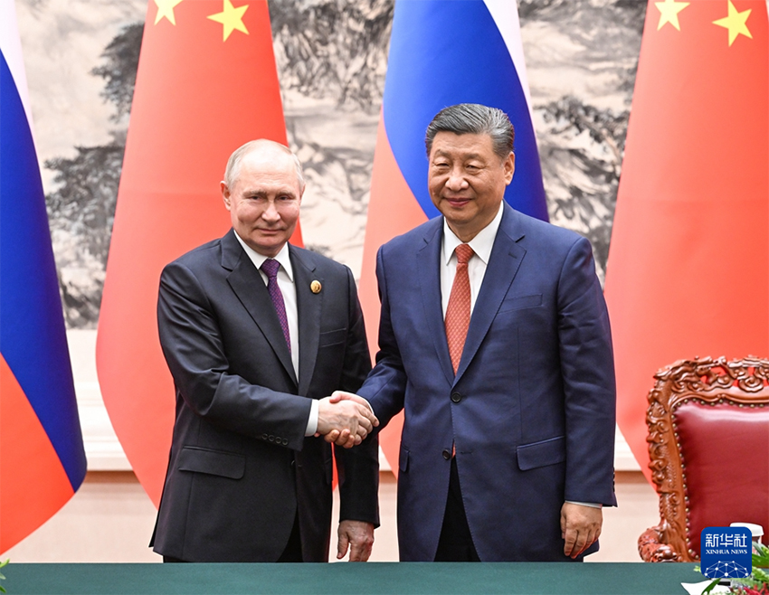Xi Jinping e Putin realizam conversa??es em Beijing, tra?ando rumo para fortalecer la?os