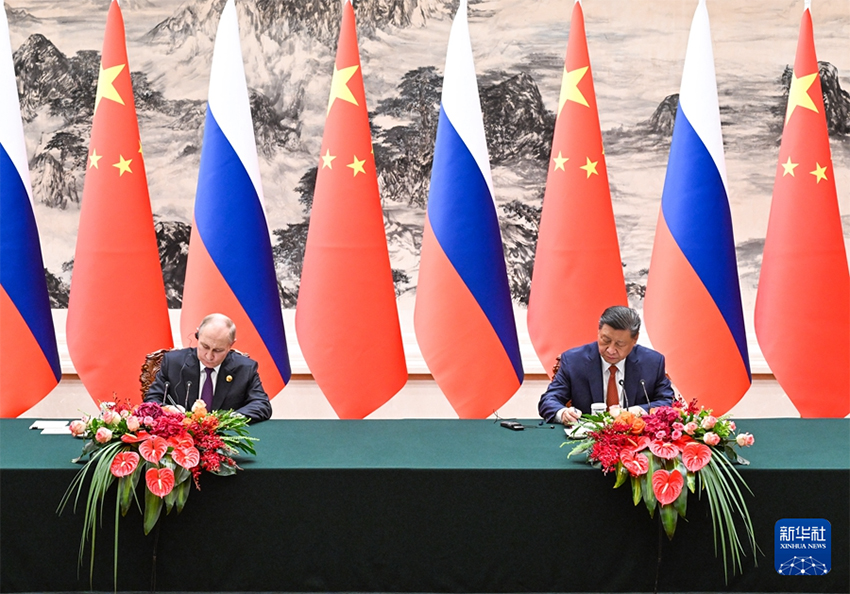 Xi Jinping e Putin realizam conversa??es em Beijing, tra?ando rumo para fortalecer la?os