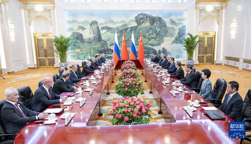 Xi Jinping e Putin realizam conversa??es em Beijing, tra?ando rumo para fortalecer la?os