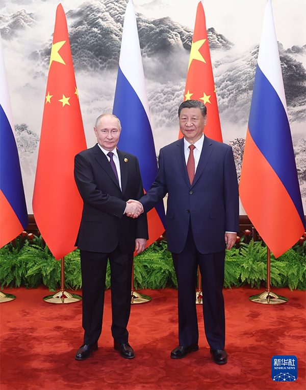 Xi Jinping e Putin realizam conversa??es em Beijing, tra?ando rumo para fortalecer la?os
