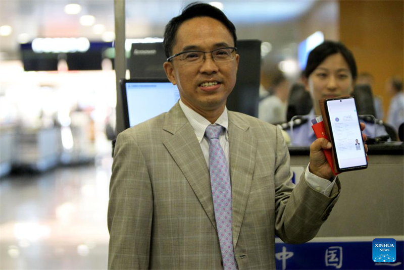 Primeiro visto eletr?nico da China concedido em Shanghai