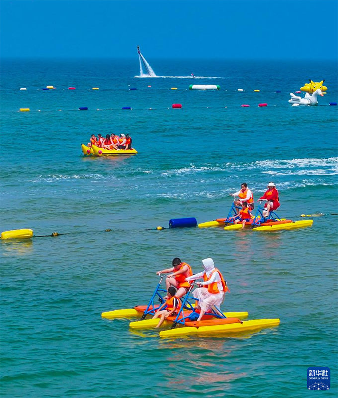 China: vários lugares entram na alta temporada de turismo durante férias de ver?o