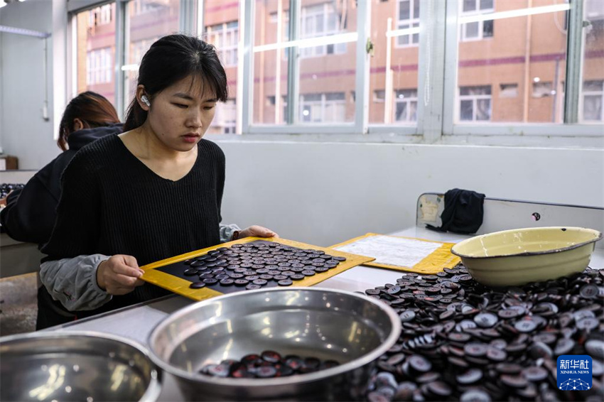 Zhejiang: Pequenos bot?es trazem grande mercado