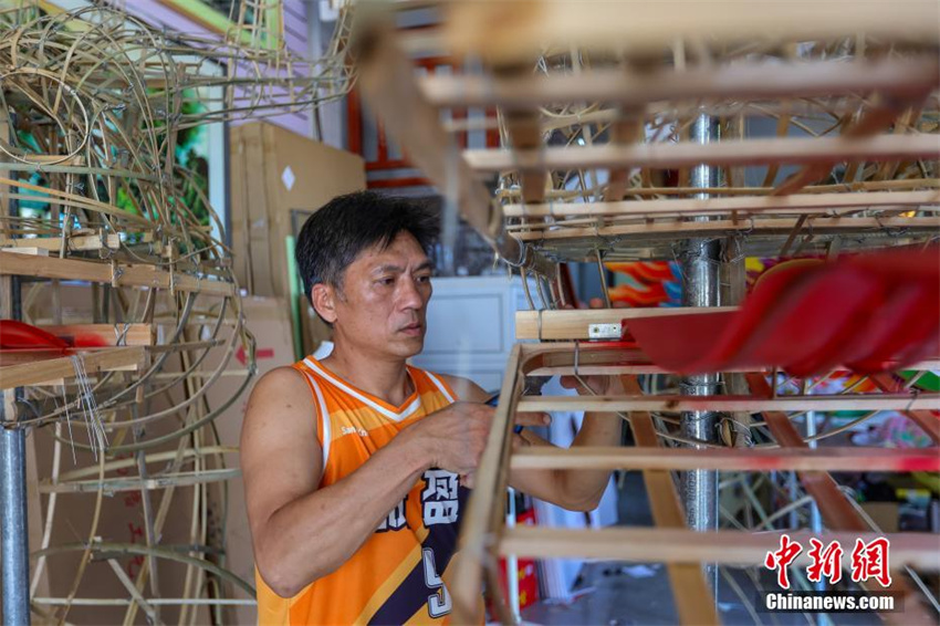 Hainan prepara cabe?as de drag?o para dar boas-vindas ao Festival do Barco-Drag?o