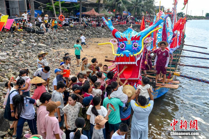 Hainan prepara cabe?as de drag?o para dar boas-vindas ao Festival do Barco-Drag?o