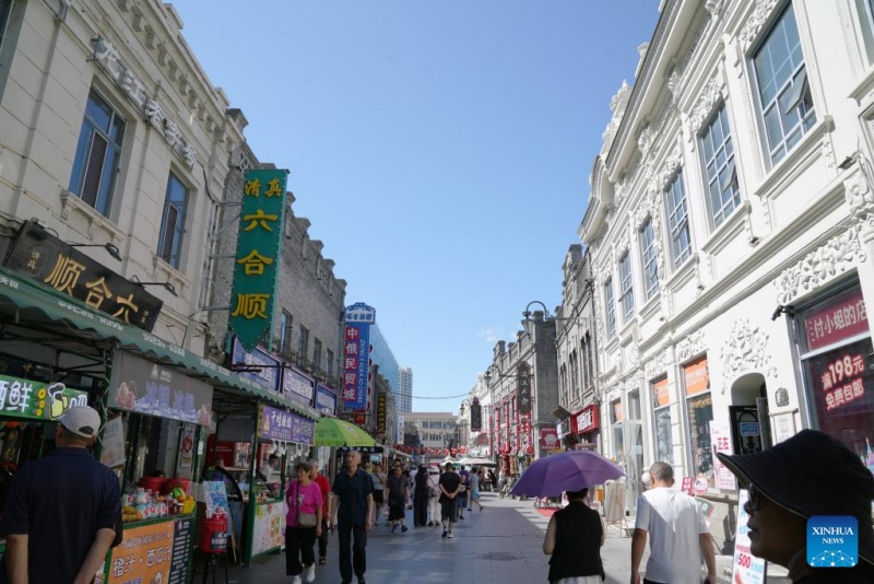Ver?o fresco em Harbin atrai turistas para férias