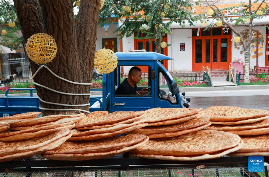 Técnicas tradicionais de fabrica??o de naan herdadas e desenvolvidas em Xinjiang
