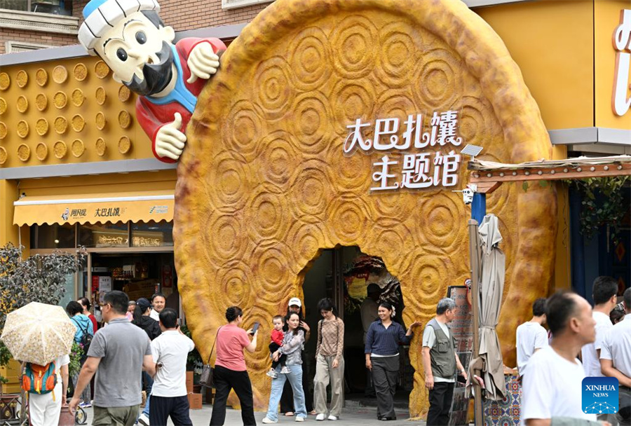 Técnicas tradicionais de fabrica??o de naan herdadas e desenvolvidas em Xinjiang